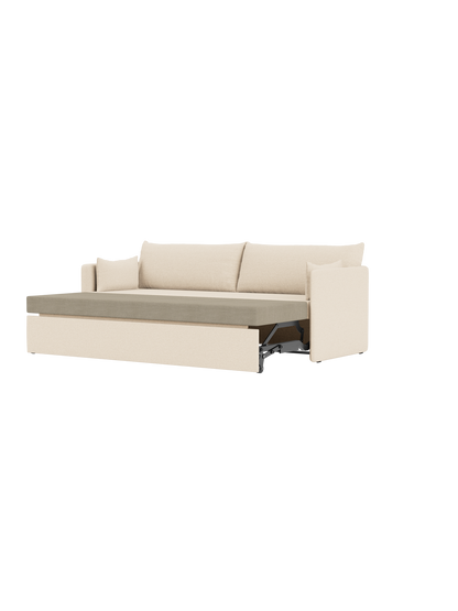 Side view of the Offset Sofa Bed in Logan Jasmine fabric, opened to show the bed mechanism and contrasting grey mattress.