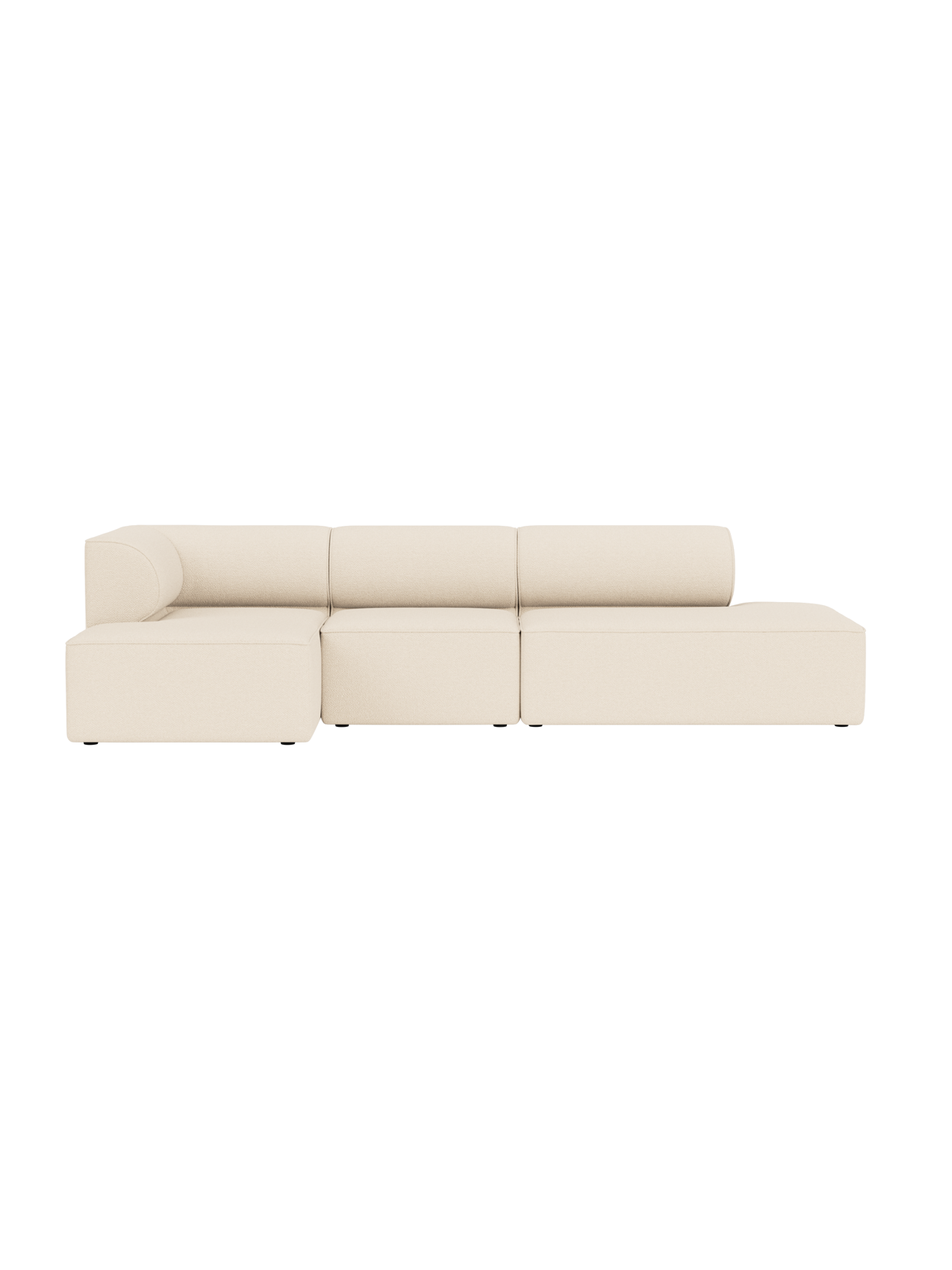 Side view of the Eave Modular Sofa, a long 3.5-seater in light cream Logan Jasmine fabric with a chaise longue on the right.