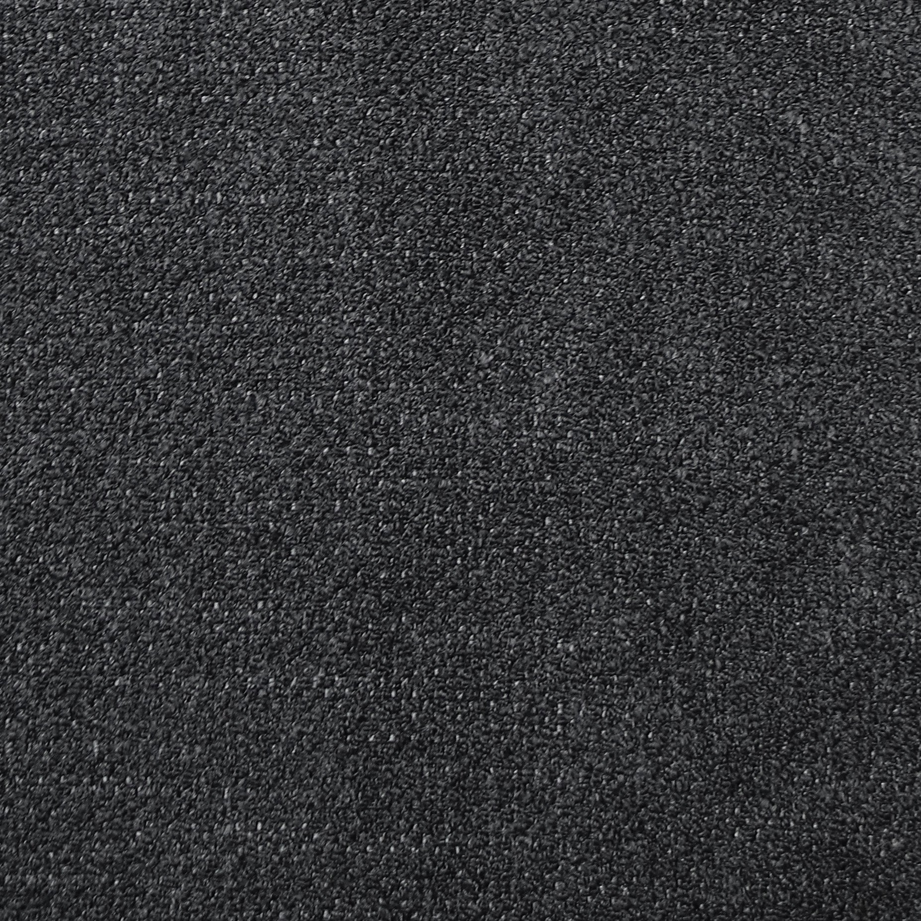 A close-up swatch of Audo Boucle 21 fabric, showcasing the dense, nubby and textured weave in a dark charcoal grey colour.