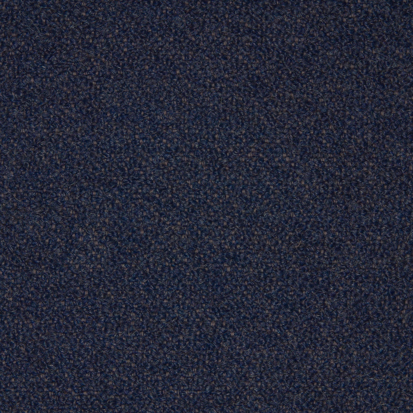 A detailed close-up of the Barnum UK Bouclé 19 fabric swatch, highlighting its textured looped weave in a dark navy blue.